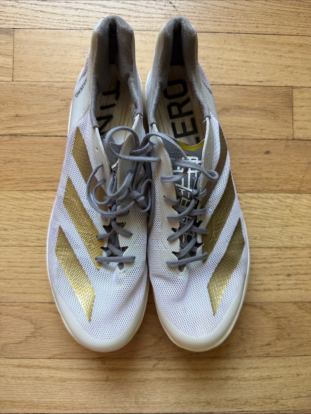 adidas adizero tinman elite White Running Shoes with Gold Stripes